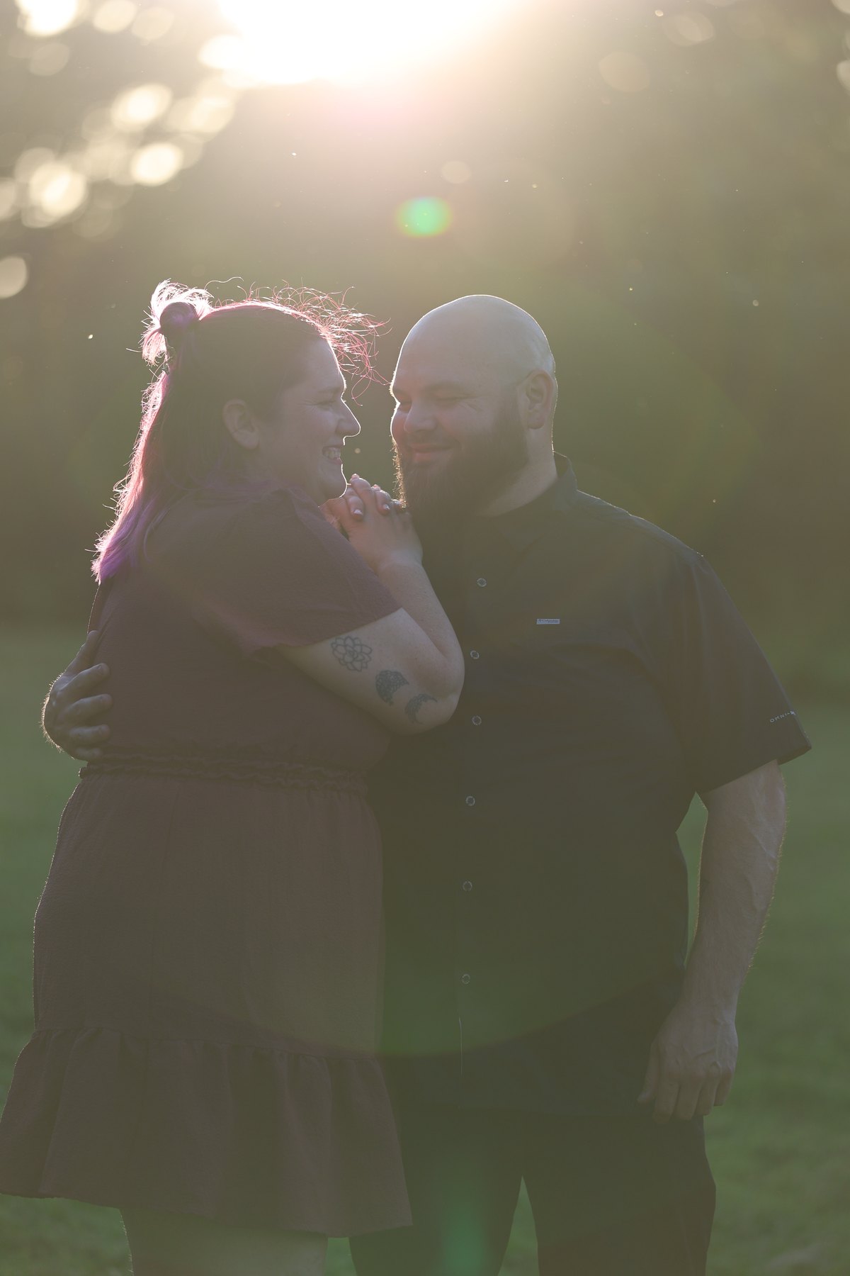 Couple portrait in backlit evening light