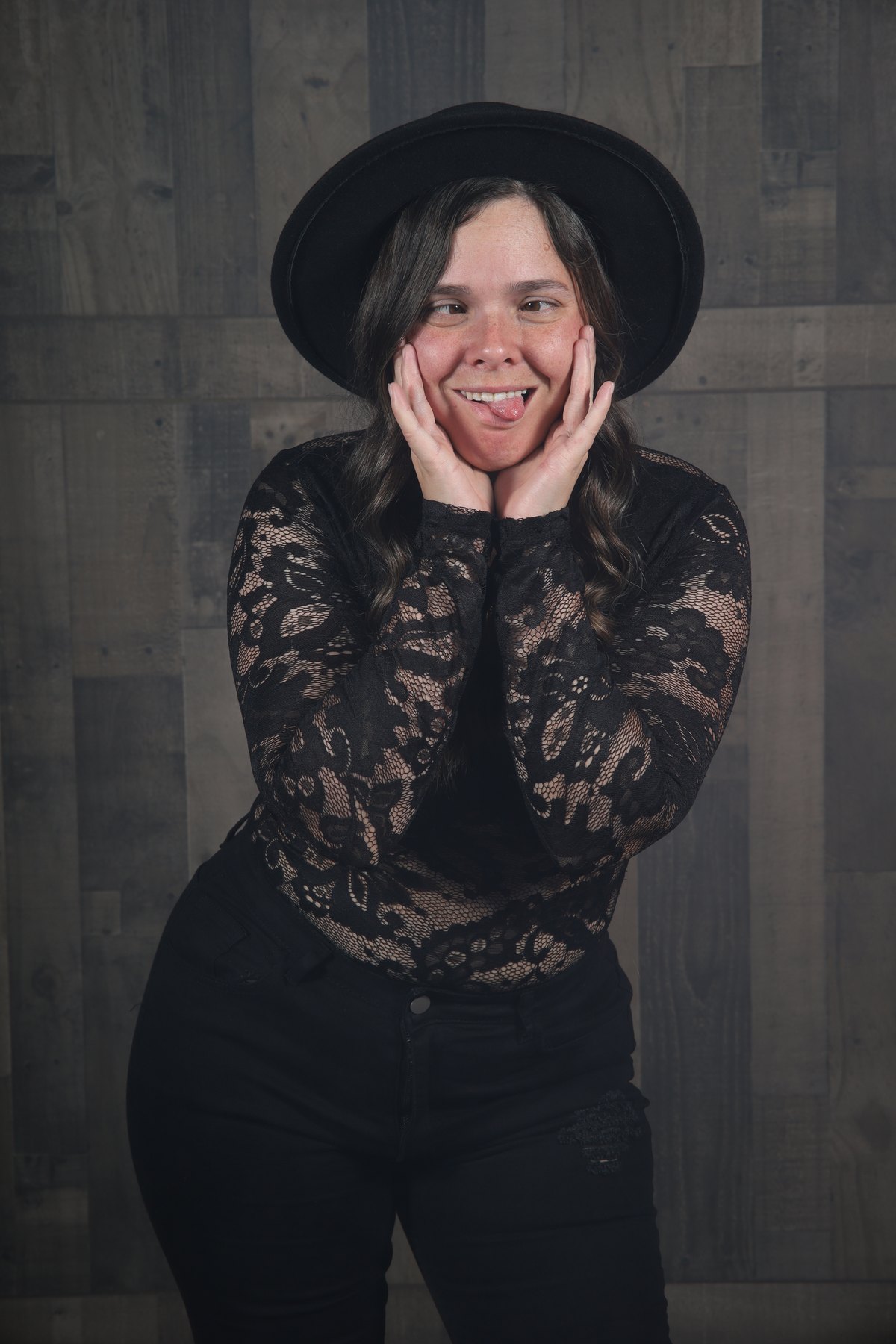 Creative studio portrait with black hat