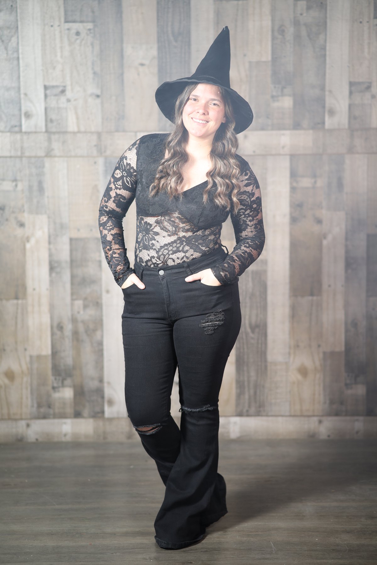 Editorial portrait against a textured backdrop