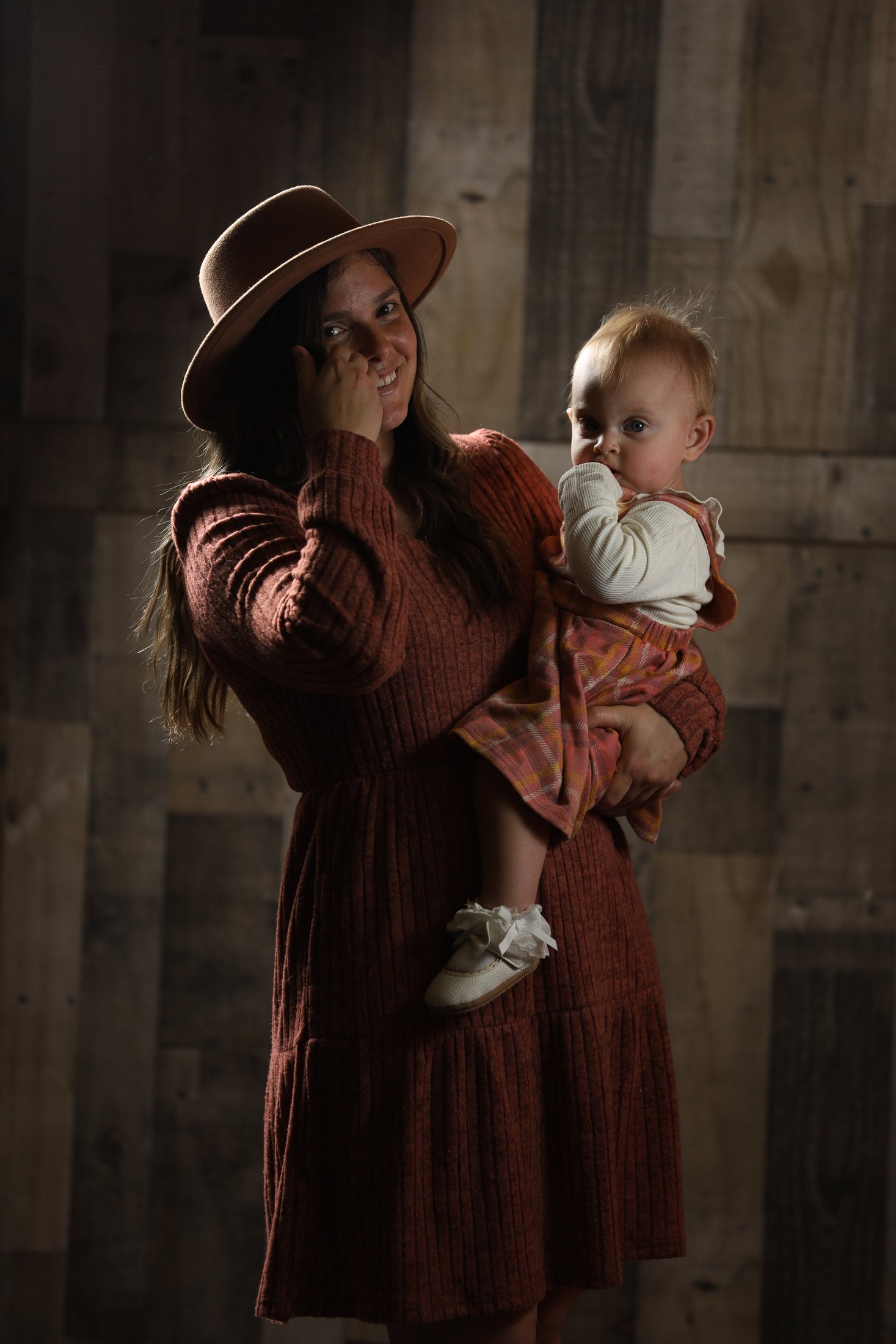 Warm studio portrait with mother and child