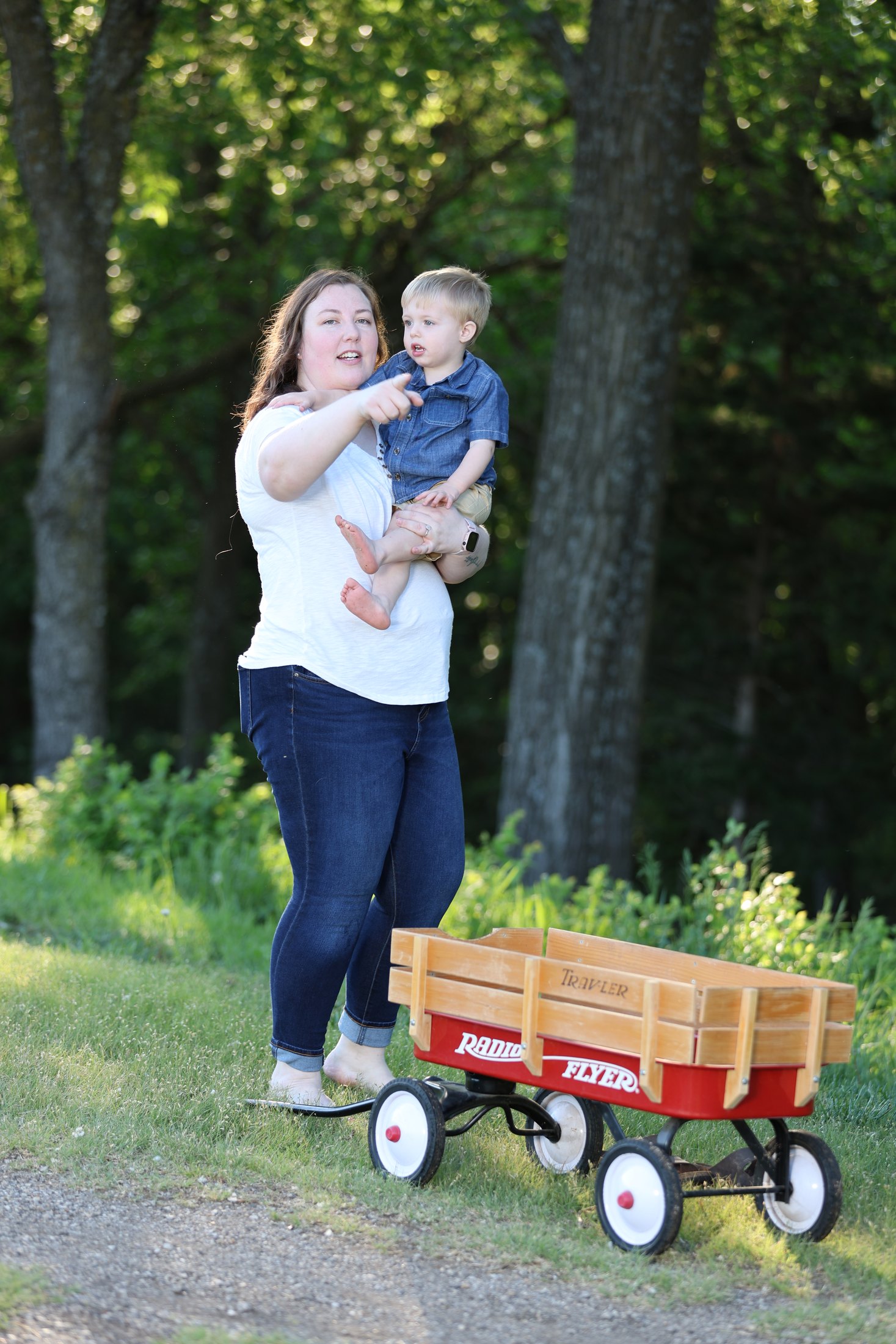 Close family moment in a meadow setting