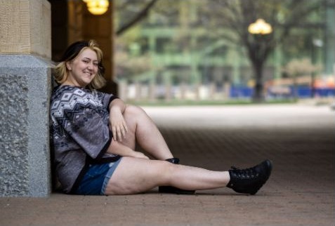 Urban senior portrait under an archway