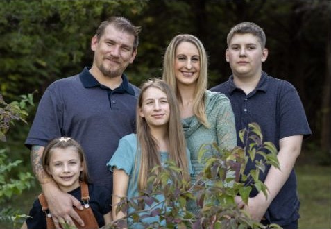 Polished outdoor family group portrait