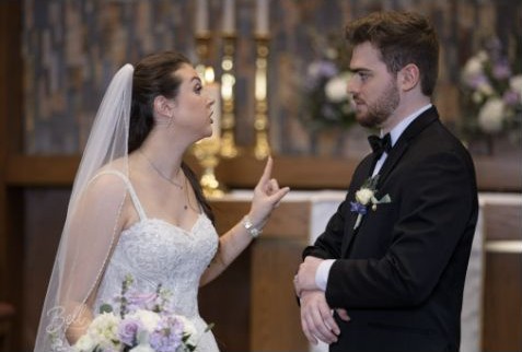 Bride and groom sharing vows during a wedding ceremony