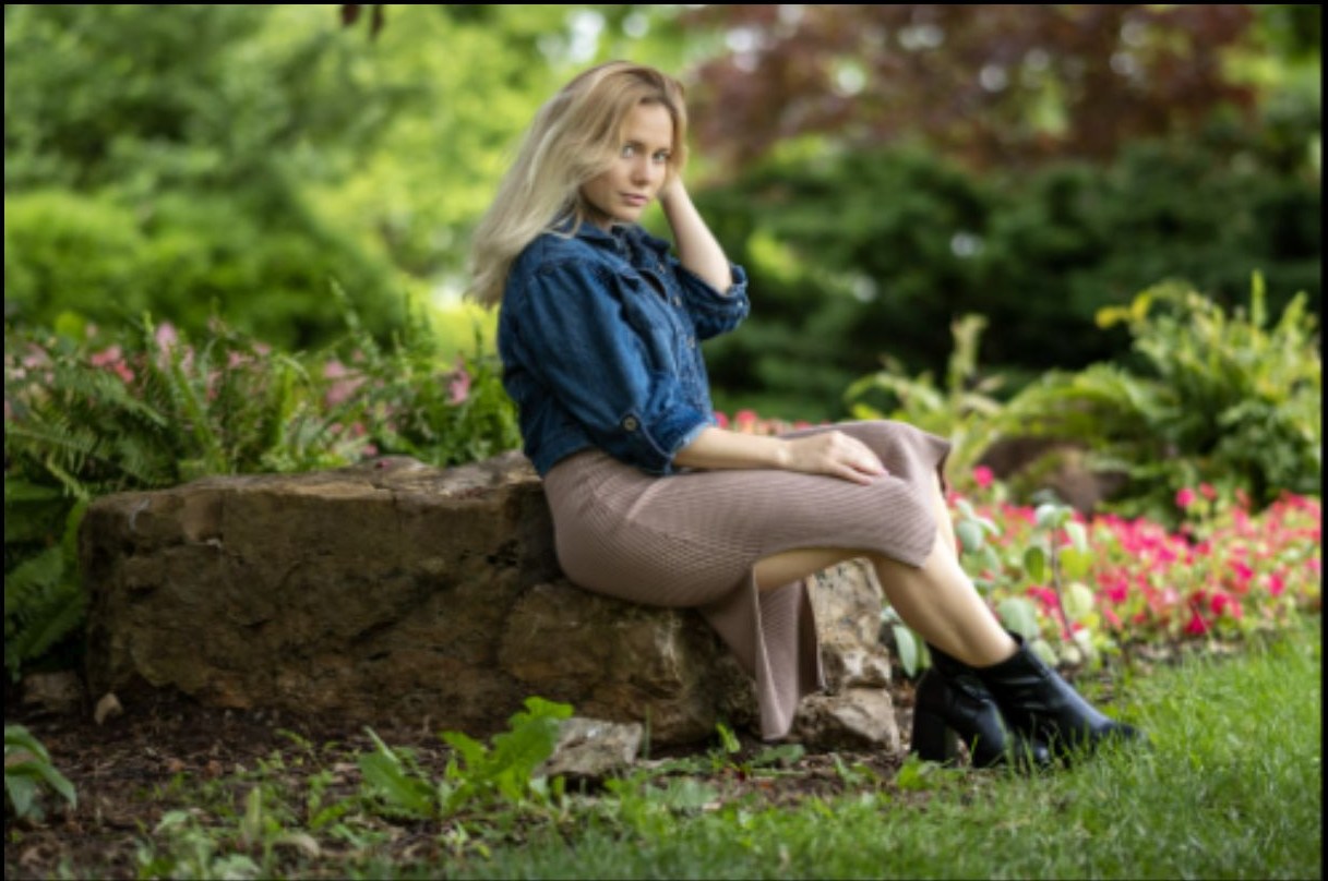 Outdoor seated portrait in denim styling