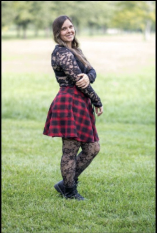 Outdoor plaid portrait in a field