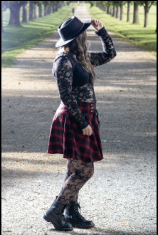 Creative outdoor portrait in plaid styling