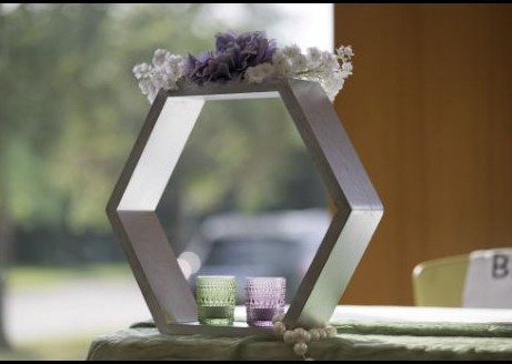 Geometric wedding centerpiece with candle detail
