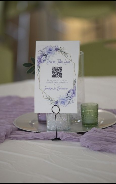 Wedding QR card placed on a reception table