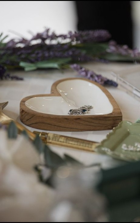 Wedding vow detail with rings and floral styling