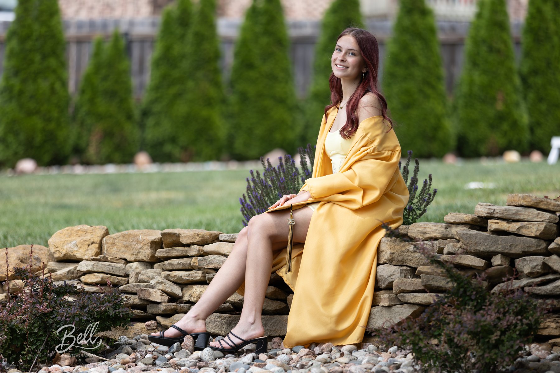Senior portrait in a formal gown outdoors
