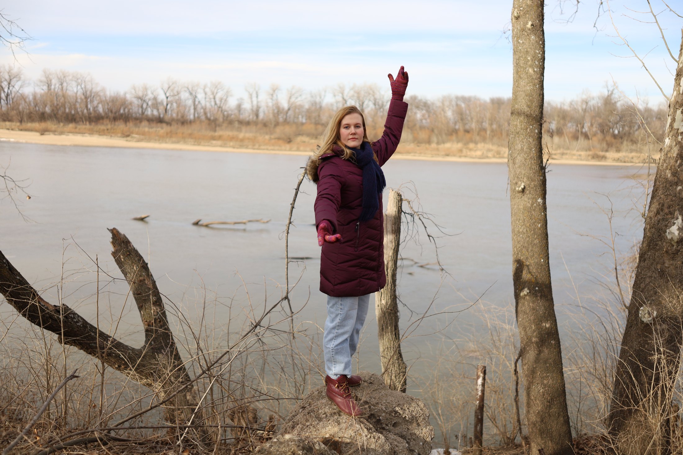 Outdoor portrait with river scenery