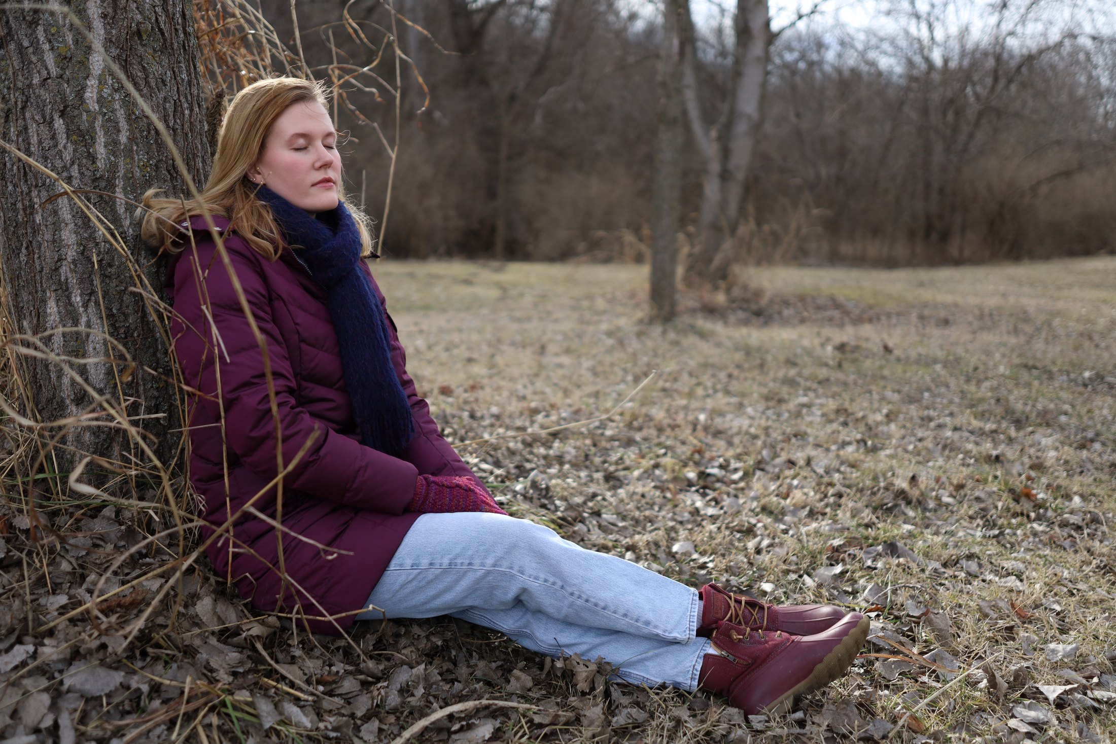 Outdoor portrait beside a riverbank